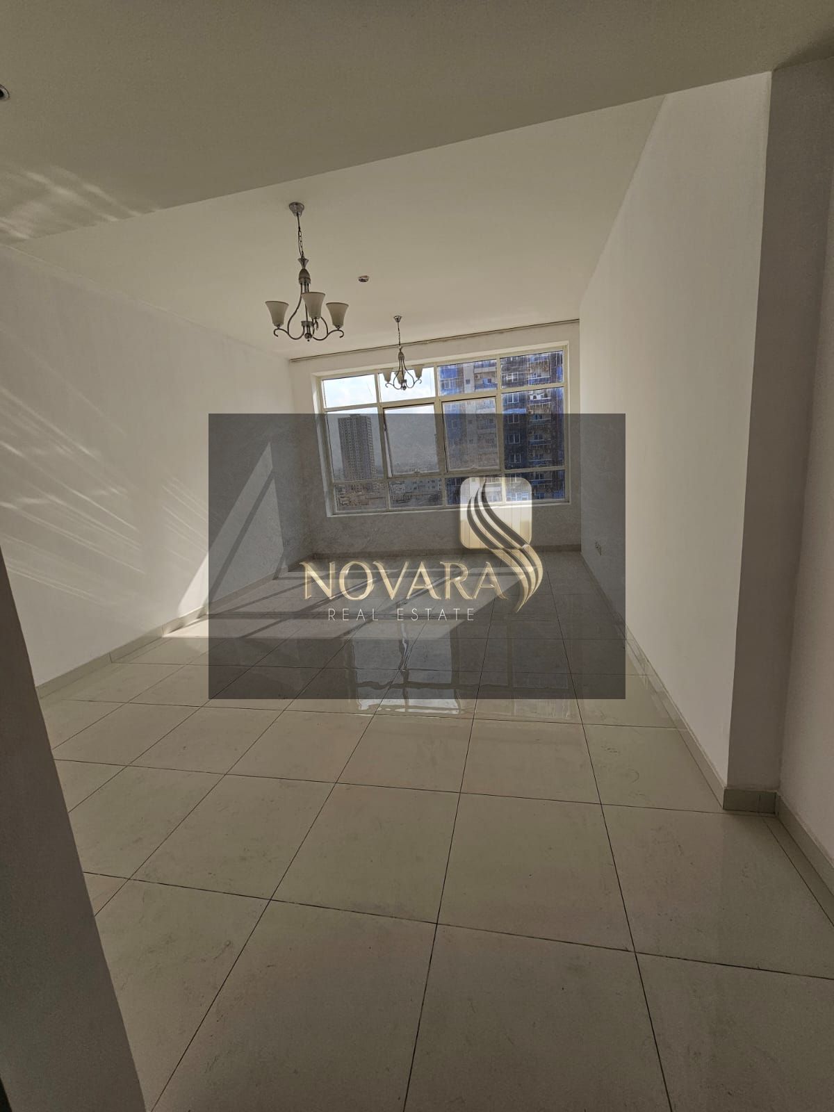 One bedroom, hall, 2 bathrooms, spacious area for rent in Al Rashidiya 3 on Khalifa Street