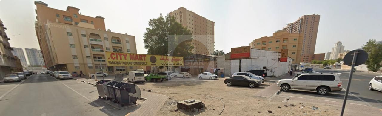 fantastic location near 6500 sq ft commercial residential corner plot G+8 behing old city mart al nuaimia 1 ajman