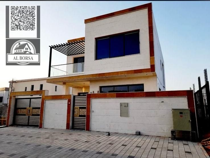 For sale, a luxurious villa in Al Yasmeen, Ajman, 5 master bedrooms, a living room, a hall, and a maid's room - at a special price, located in a strat