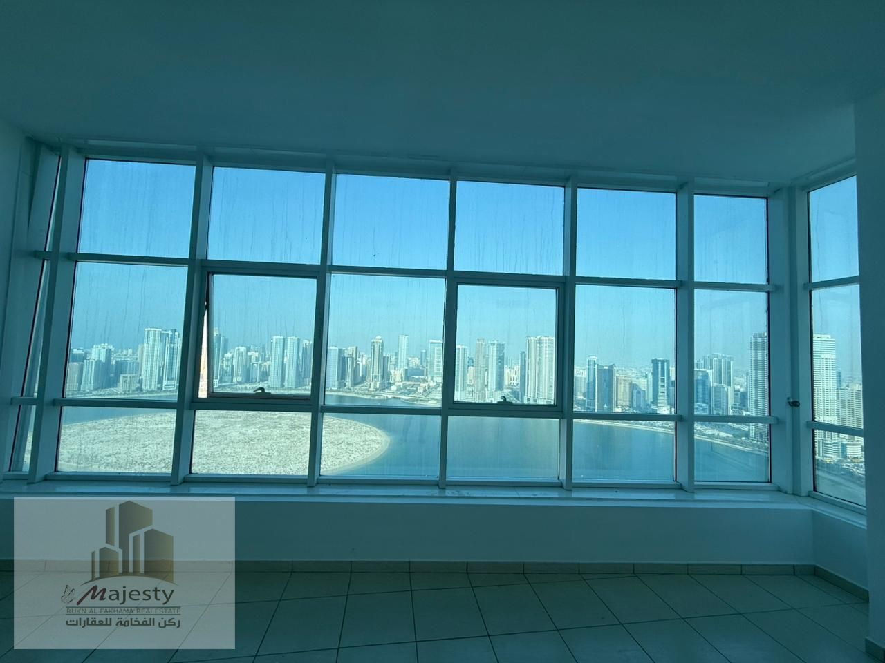 For sale: an apartment with a very special view of the lakeside corniche in the Emirate of Sharjah.