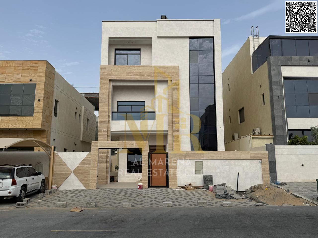 Luxury super deluxe villa for sale in Al Yasmeen area, Ajman, freehold for all nationalities, price inclusive of electricity and water
