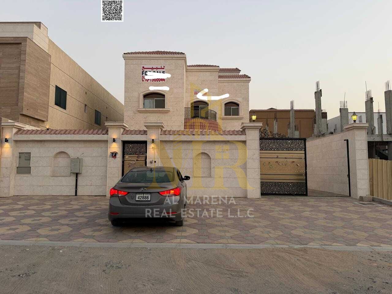 Luxury two-story villa with a rooftop terrace in Al Muwaihat 1, Ajman. Price includes electricity, water, and air conditioning. Freehold ownership.