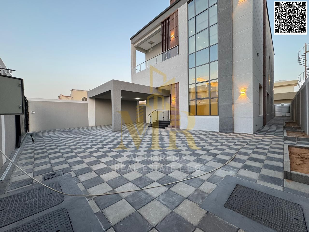 Luxury corner villa, two floors and a roof, with a modern design in Al Rawda 2, Ajman, in a prime location with integrated services. Price includes ai