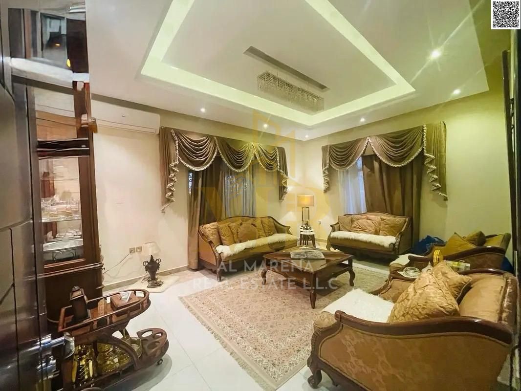 A commercial residential villa in Al Rawda on the main street, with a price including electricity, water and air conditioning fees, ready to live in t
