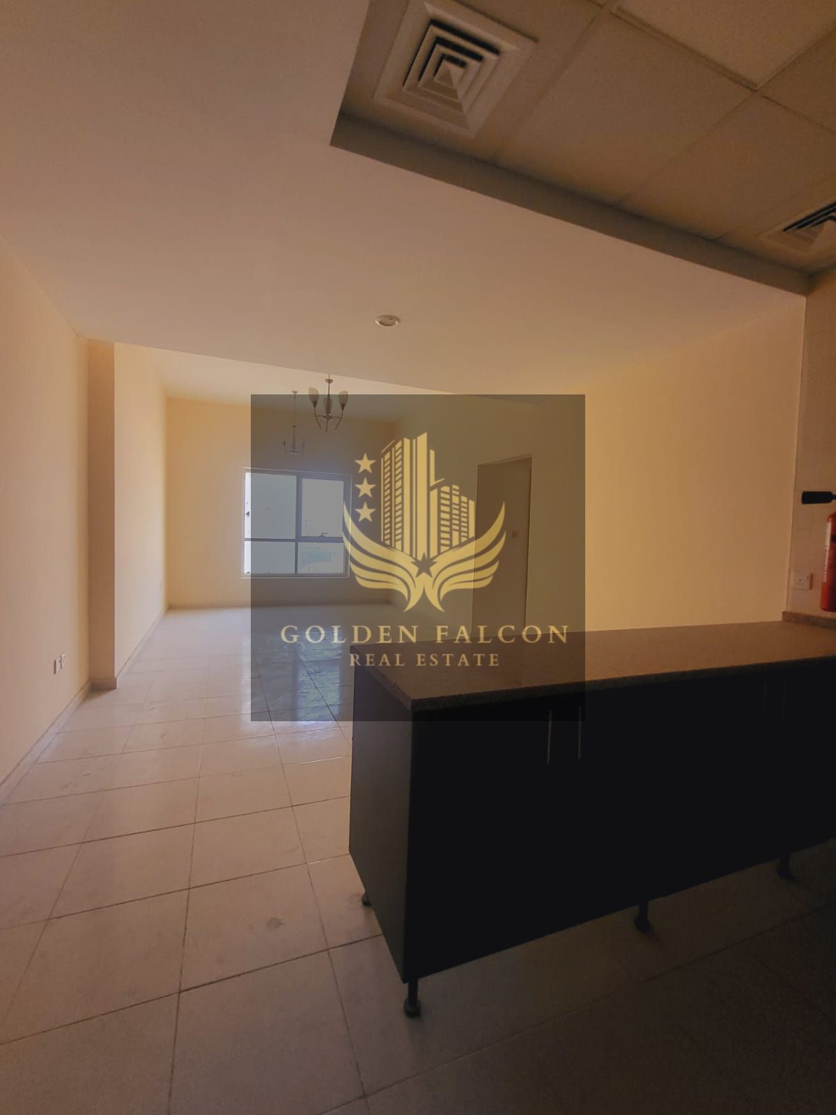 Spacious 2BHK apartment with a large balcony and podium view in Emirates City, Ajman — perfect for comfortable family living!