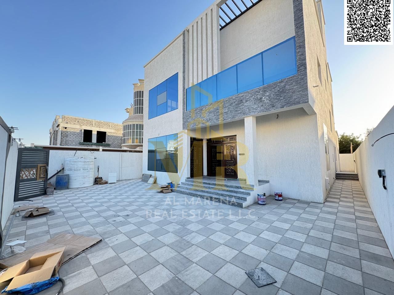 Villa in Al Muwaihat, 3 corner units, two floors and a roof, 7 rooms and an annex, including electricity, water and air conditioning, first occupancy,