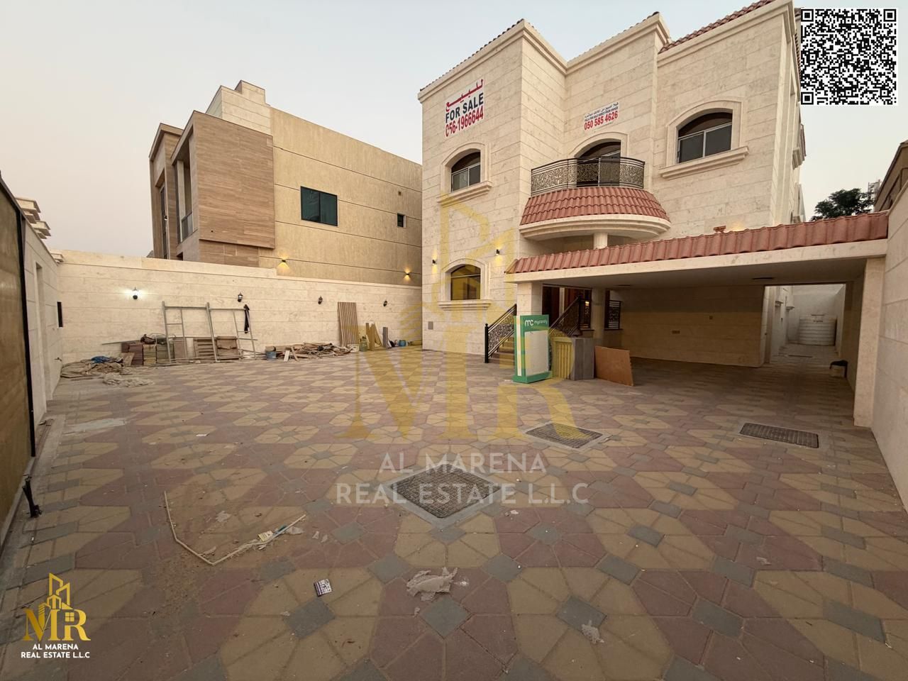 Luxury two-story villa with a rooftop terrace in Al Muwaihat 1, Ajman. Price includes electricity, water, and air conditioning. Freehold ownership.