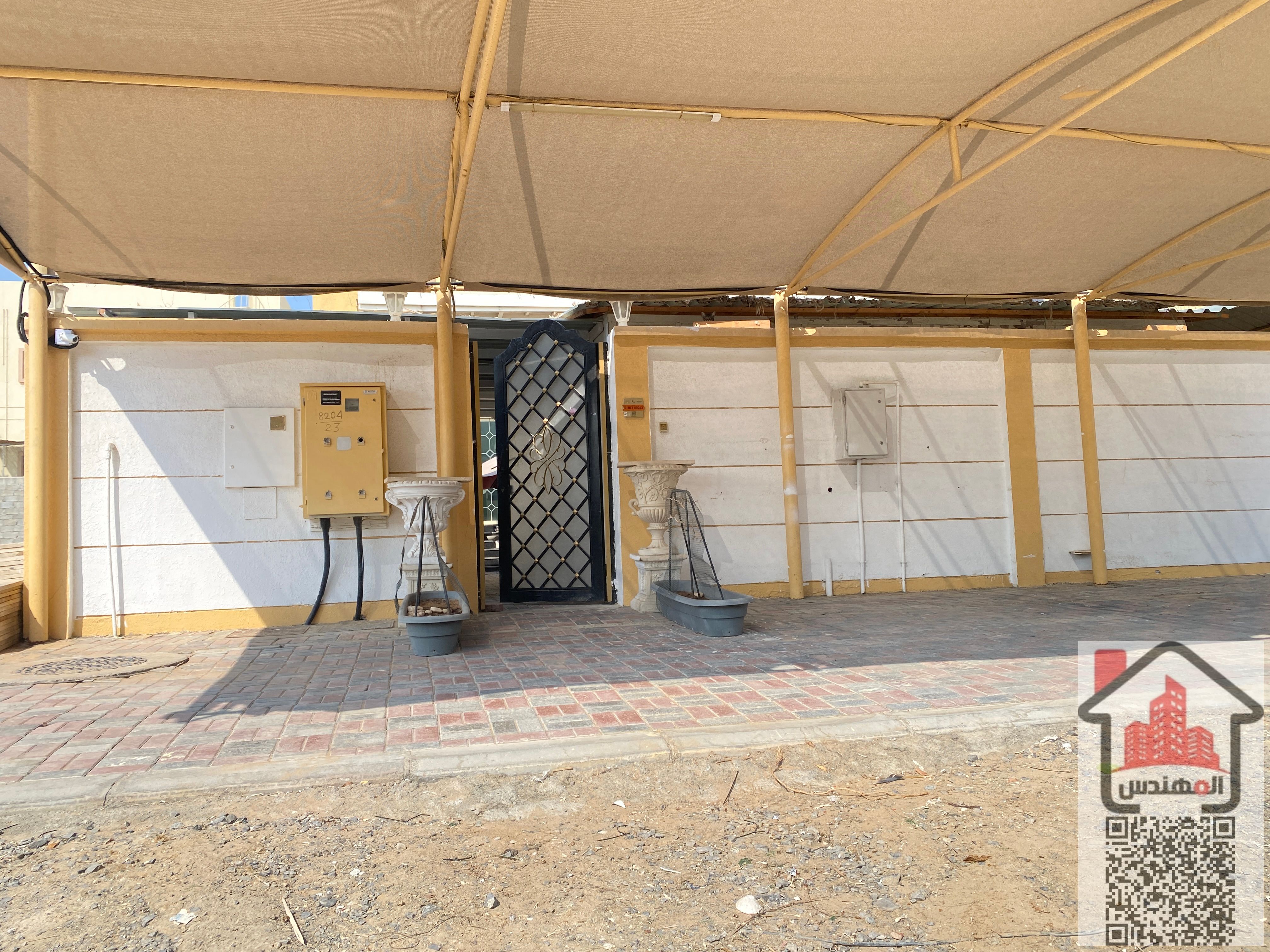 Furnished annex for rent in Ajman, Al Rawda 1 area. It includes a bedroom, living room, bathroom, and a full rooftop terrace. The rooftop terrace consists of only a bedroom and living room. Features include an internal elevator, a yard, and an external ca