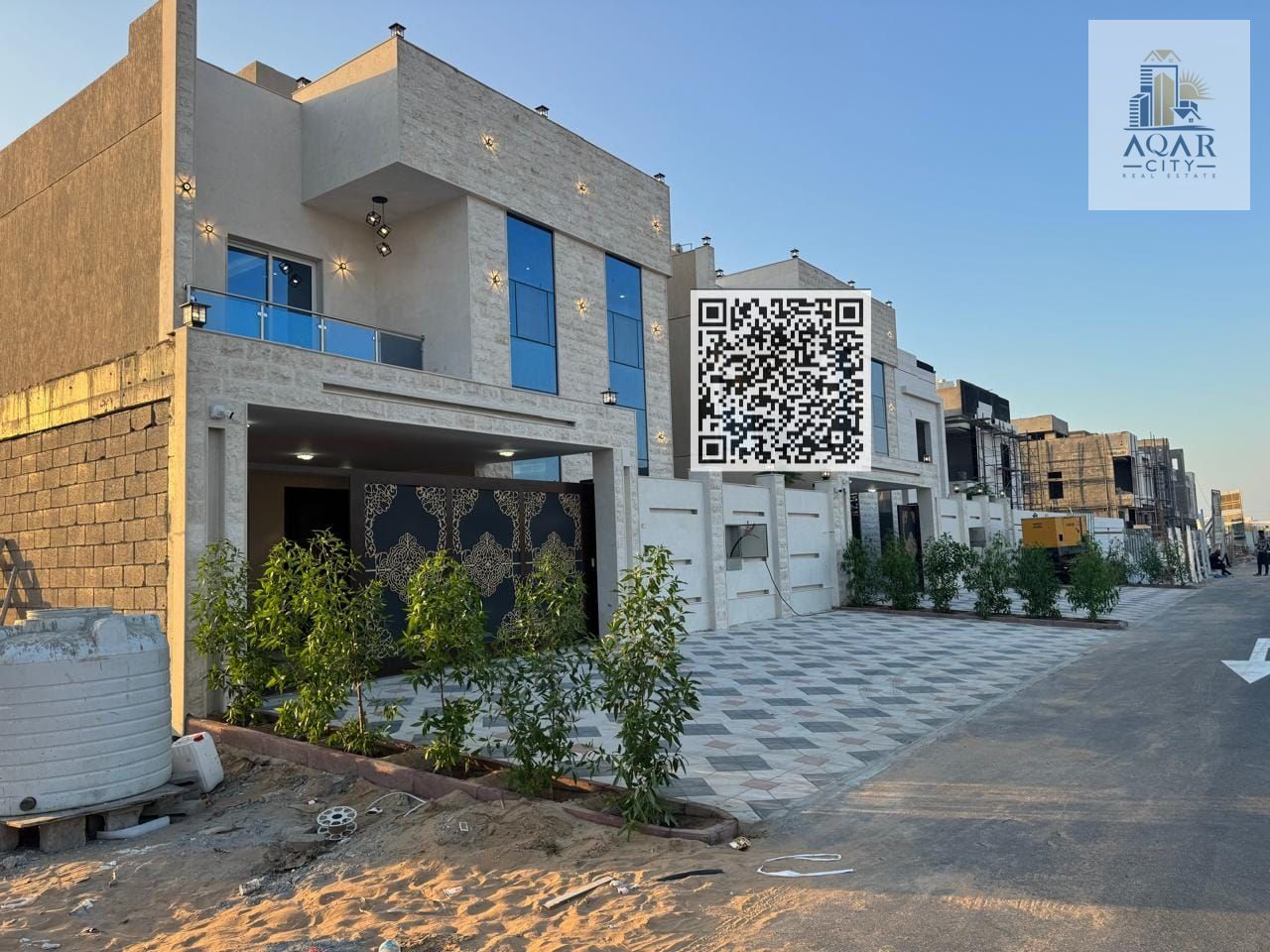 Spacious 5 bedroom Majlis villa available for sale in Ajman Al Helio 2 including central air conditioning, including registration fees