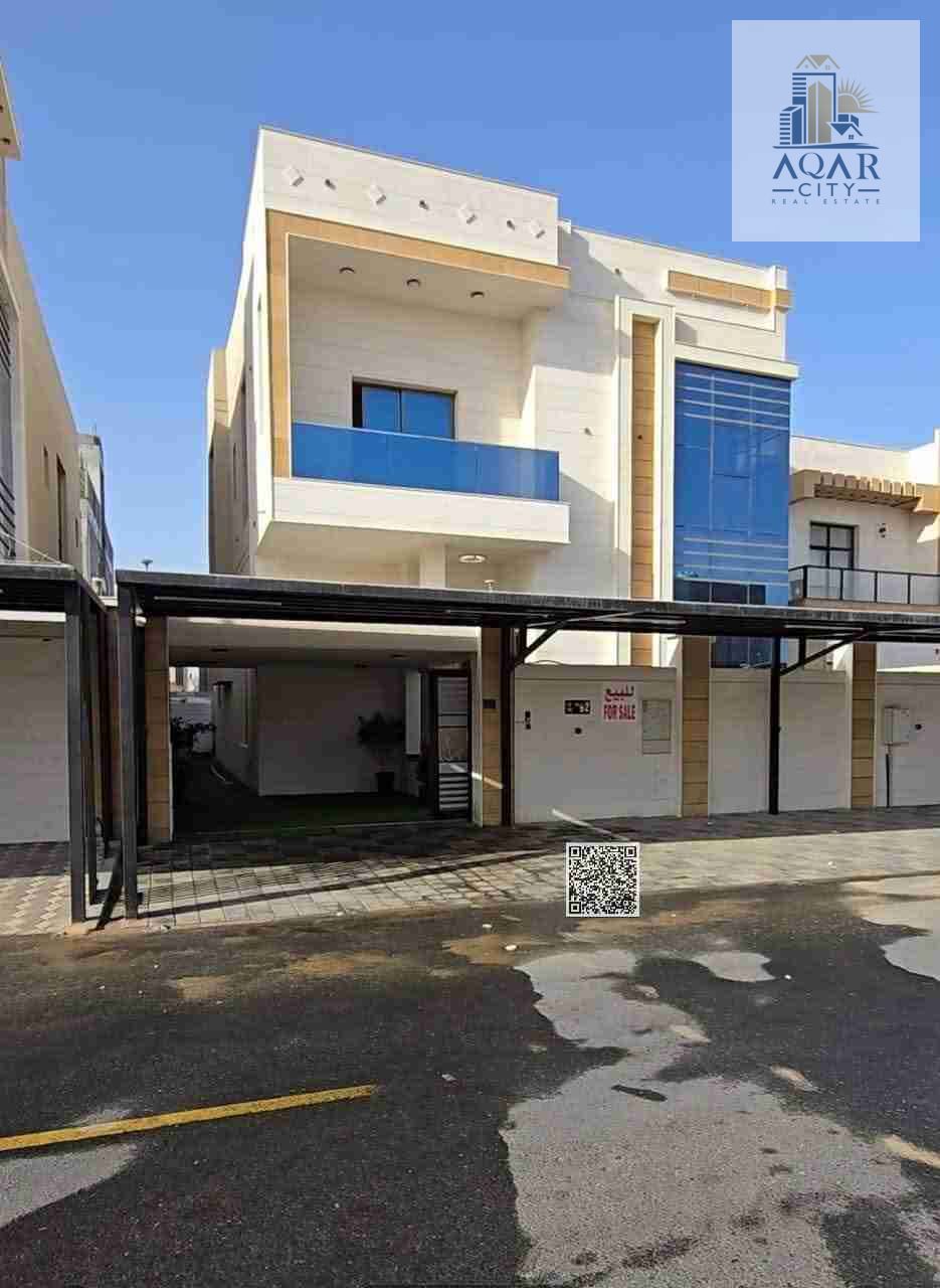 Villa for sale in Al Zahya area, Ajman, including all services. Electricity, water, and air conditioning. Custom finishing, on a main street.