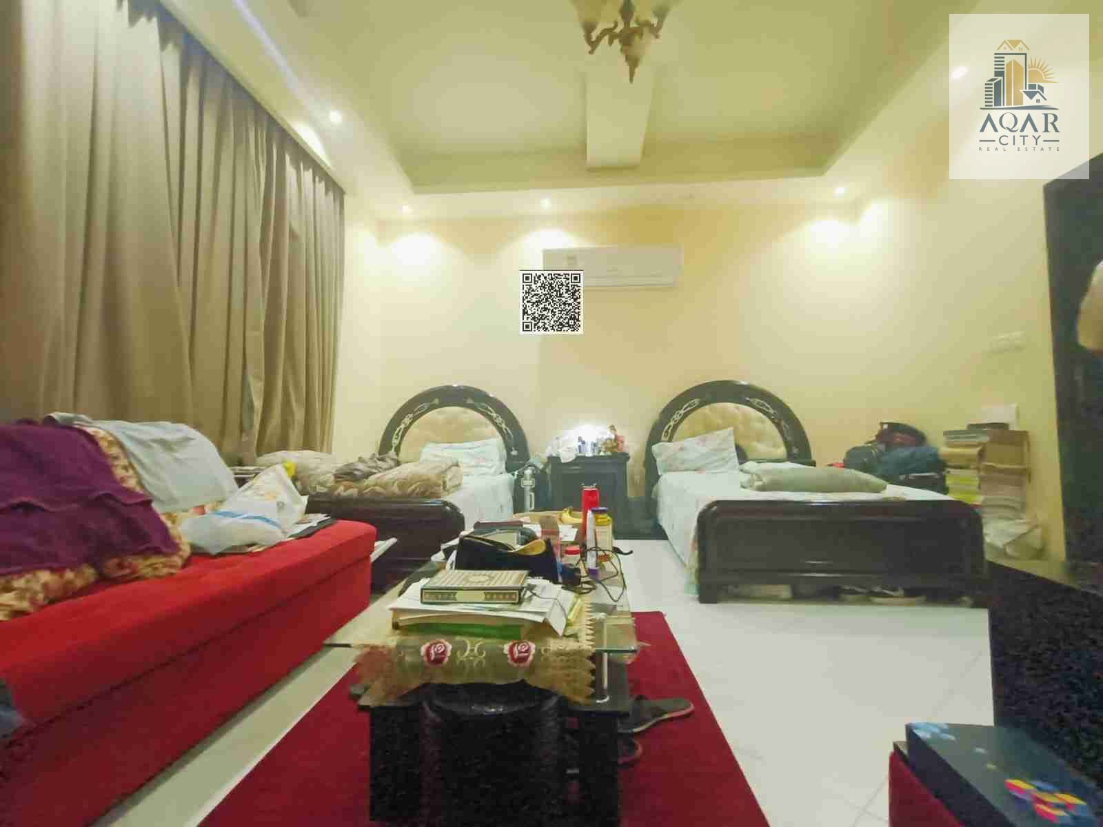 For sale, a residential and commercial villa in Al-Muwaihat 3, a spacious garden and a children's play area, 5 master rooms, 5000 square feet