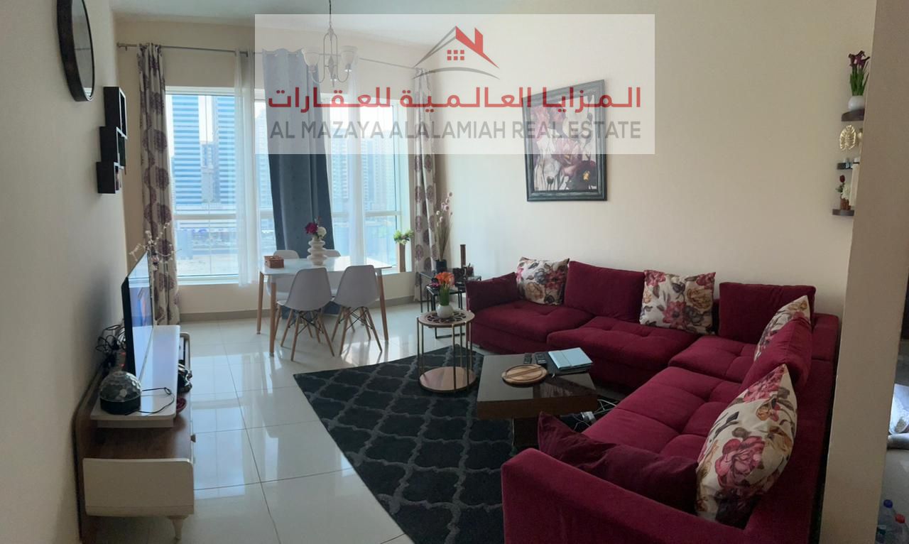 A fully furnished one-bedroom apartment in Al-Taawun for monthly rent with internet