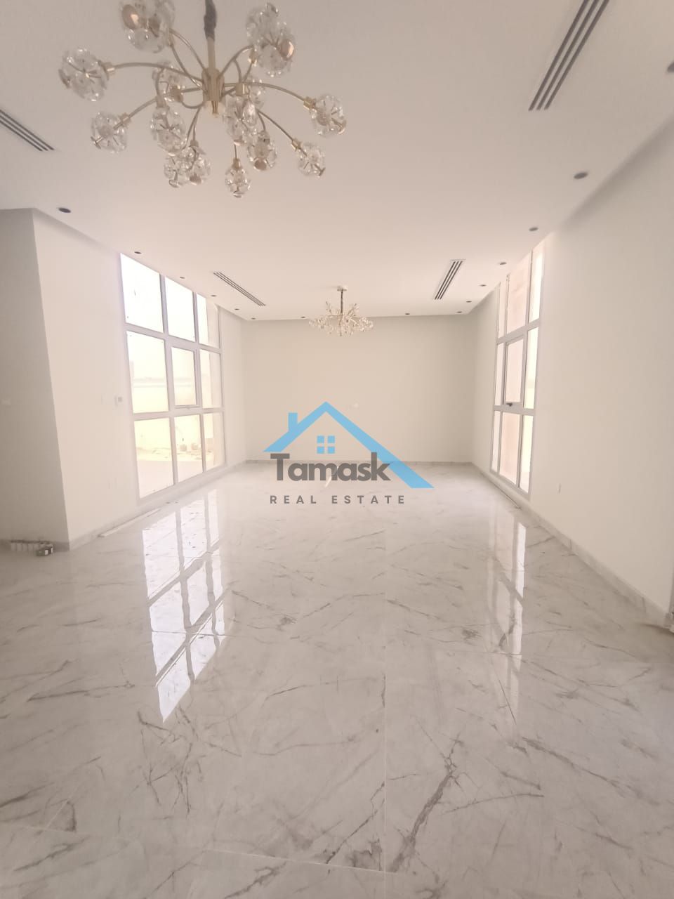 For rent: Brand new villa in Al Awir, first occupancy, two floors, 5 bedrooms, maid's room, living room, majlis, covered parking, central air conditio