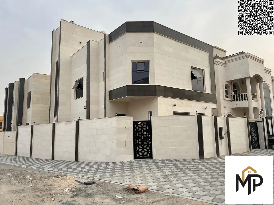 Luxury corner villa for sale in Al Yasmin - behind the park with a modern two-story design and a rooftop that combines luxury and a prime location