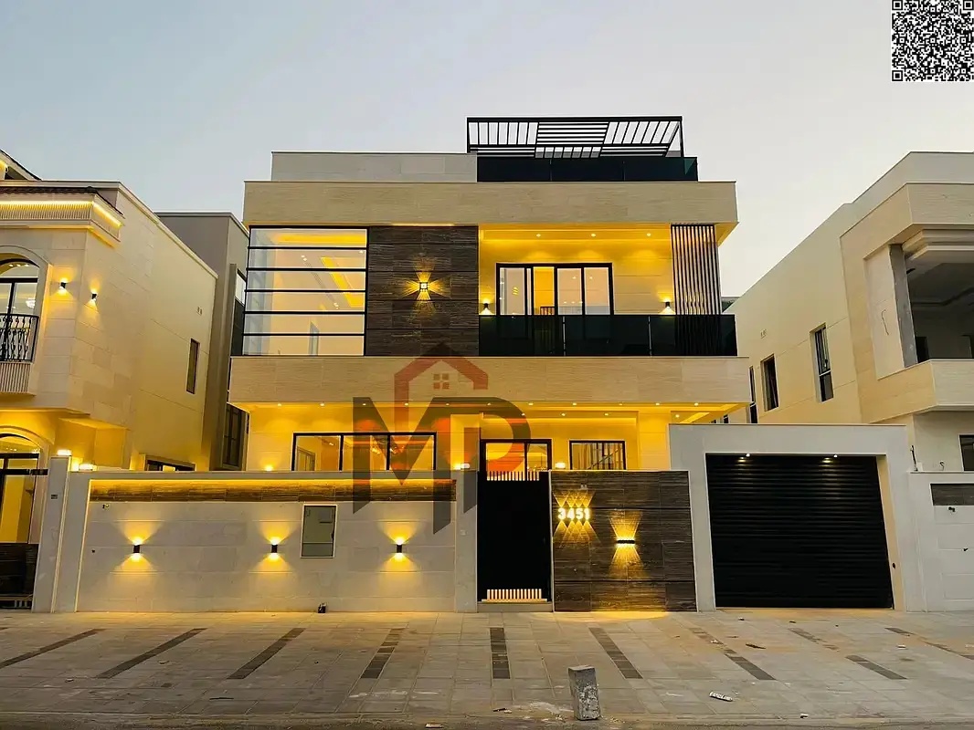 A luxurious two-story villa with a spacious courtyard, near Sheikh Mohammed Bin Zayed Road, freehold ownership for life for all nationalities, combini
