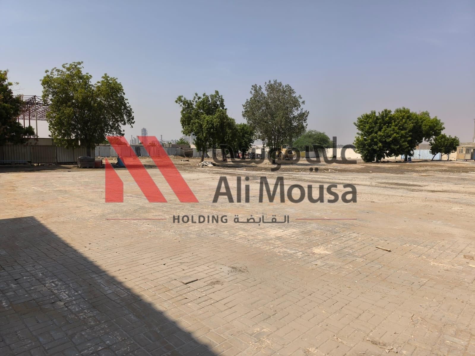 Spacious Open Yard for Rent – Ali Mousa Compound, Sajaa