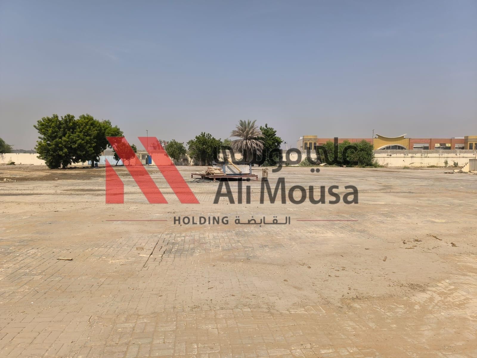Spacious Open Yard for Rent – Ali Mousa Compound, Sajaa