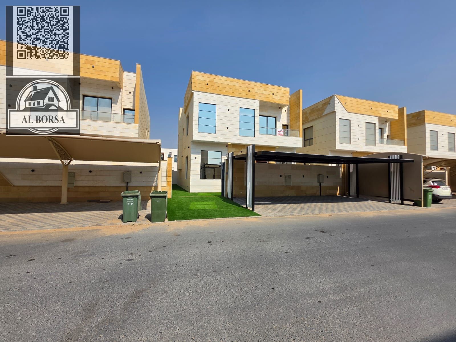 Luxury villa for sale in Al Yasmin, Ajman, featuring 5 master bedrooms, a majlis, a living room, and a maid's room. Strategically located near Mohamme