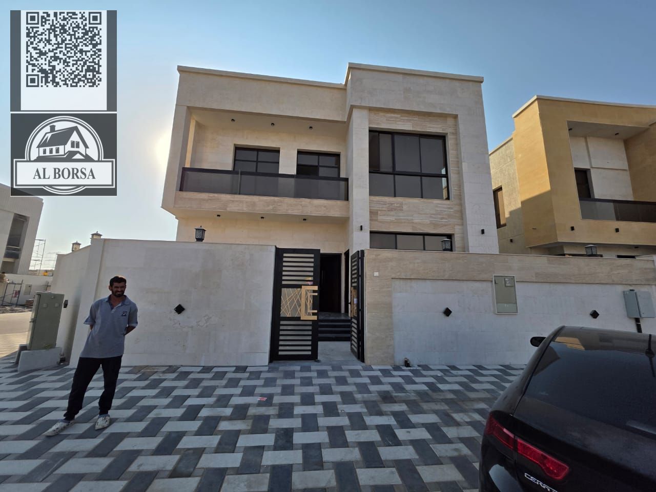For sale in Al Yasmin, a corner villa with electricity, water, central air conditioning, 5 master bedrooms, a majlis and a living room, and a maid's r