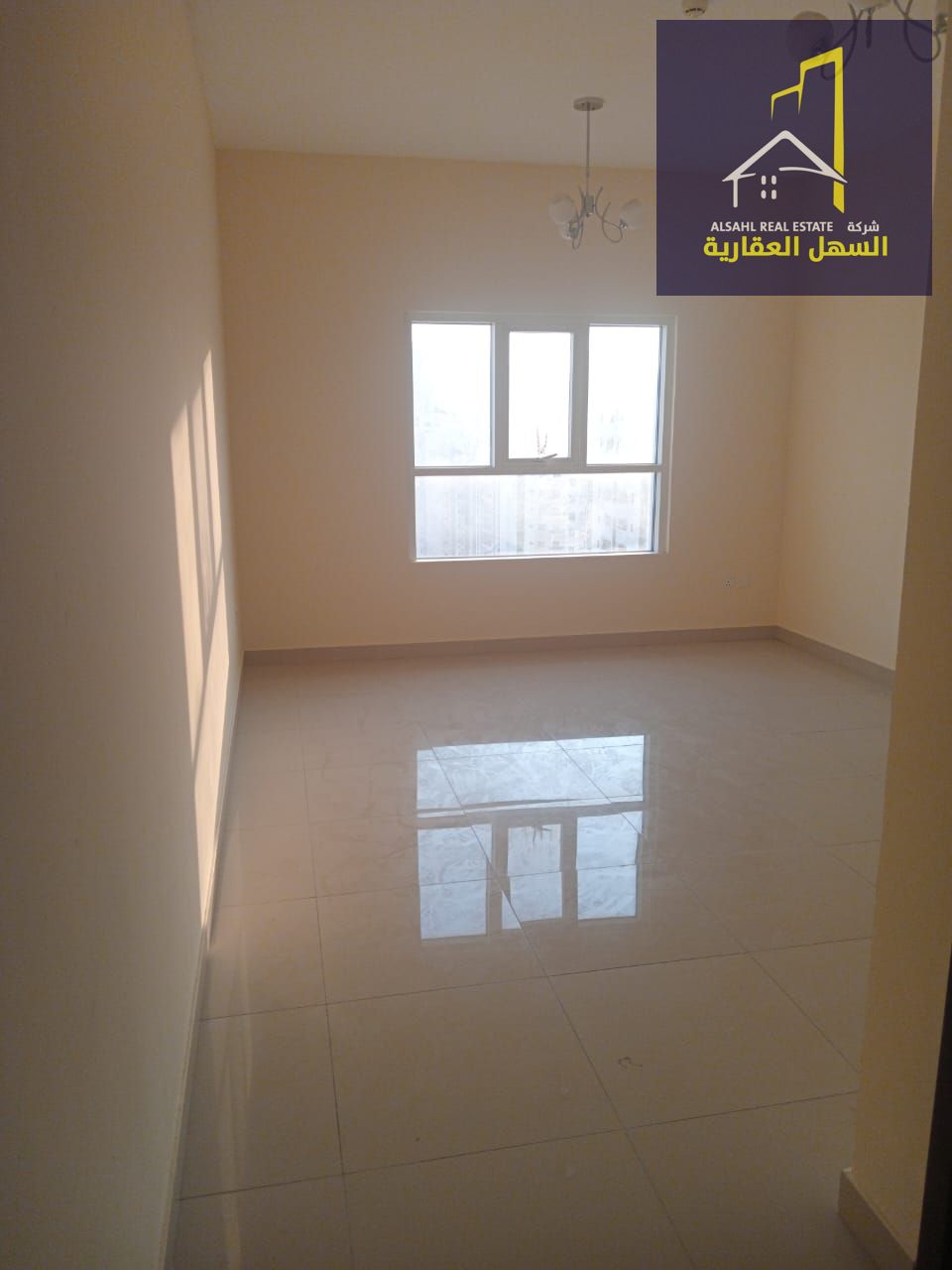 Two-bedroom apartment with a living room in a modern tower, prime location on King Abdulaziz Street