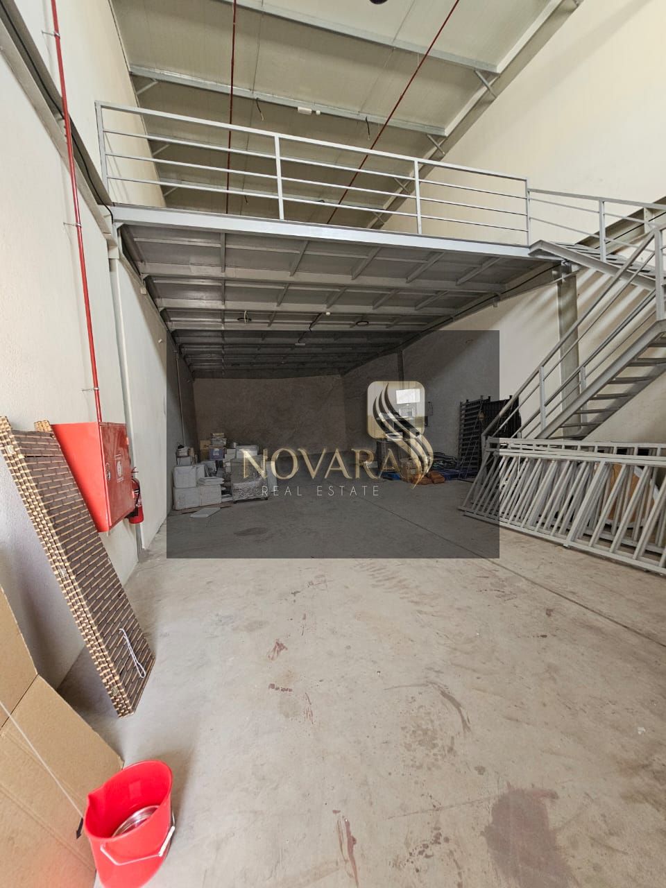 Prime warehouse for rent in a strategic location in Al Jurf Industrial Area 1, with an area of 2600 sqft.