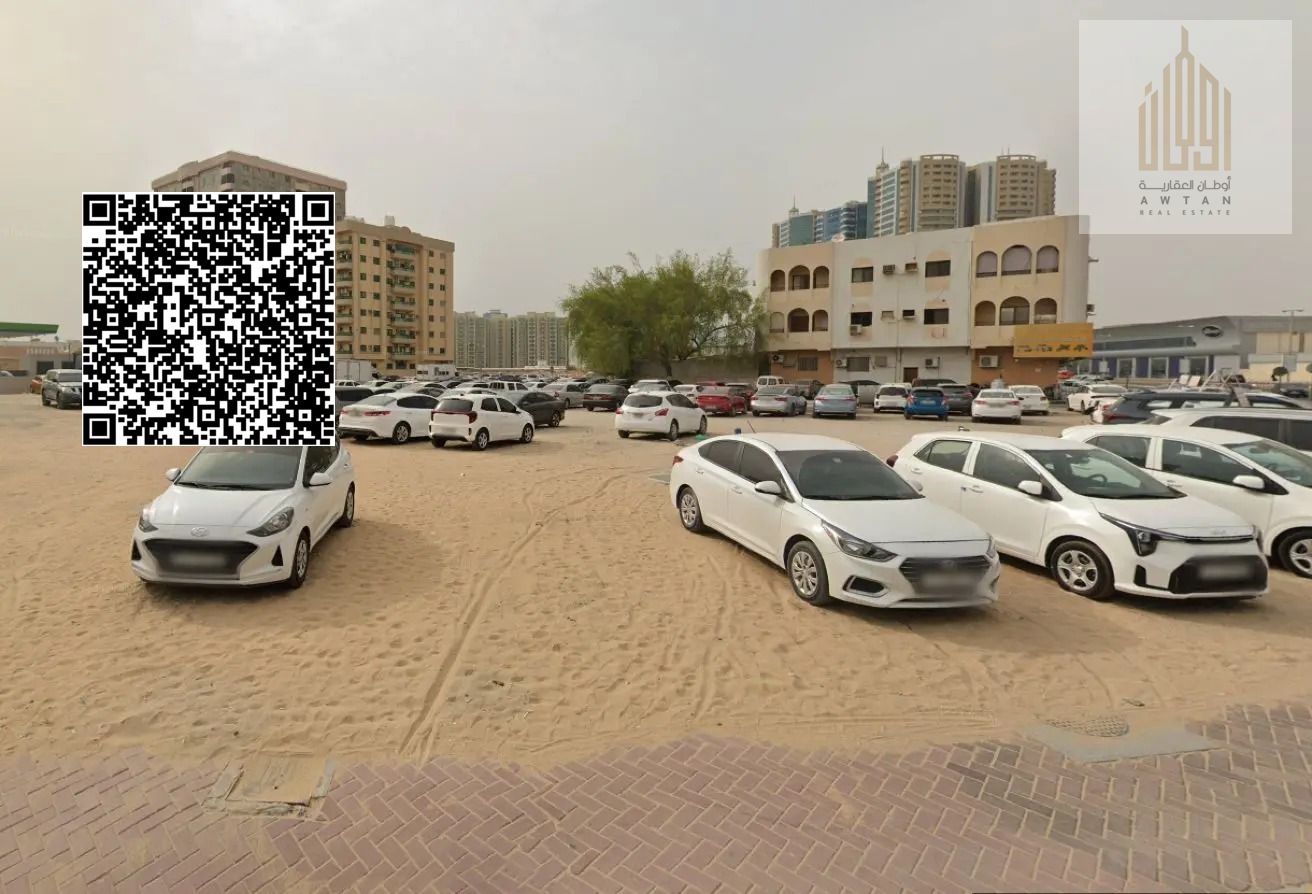 Commercial land for investment, ideal for building a tower in a prime location. Land for sale next to Gulf Towers, Al Rashidiya 1. For investment en