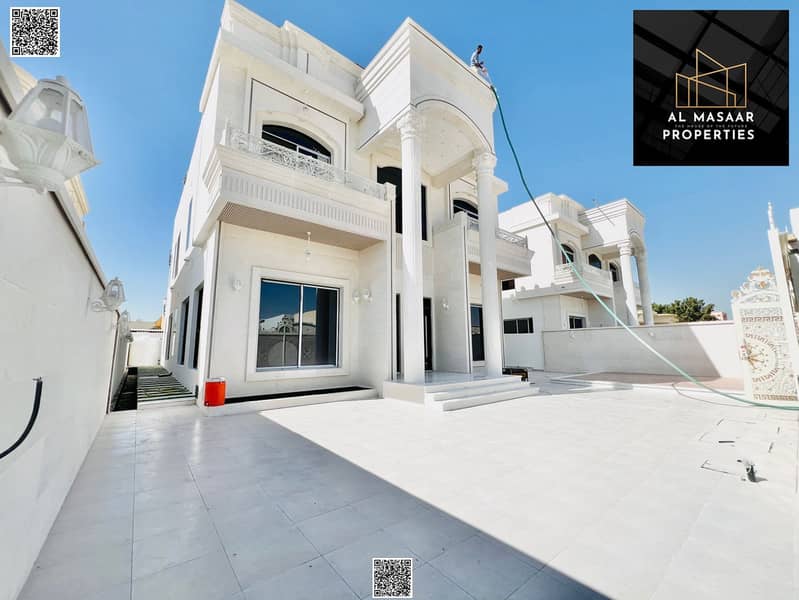 Ready-to-move-in villa for sale in Al Rawda, close to all services, registration fees included.