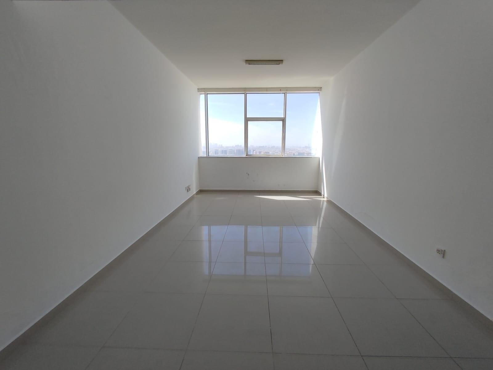 Huge studio Nahda border near Dubai bus stop with- 32000 /6 cheq (31K /1 cheq)