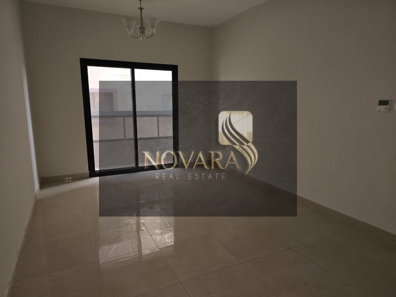Apartment for rent in Al Jurf 3, two bedrooms and a living room, equipped kitchen and bathroom, rent 38,000 dirhams, flexible payments, ready to move