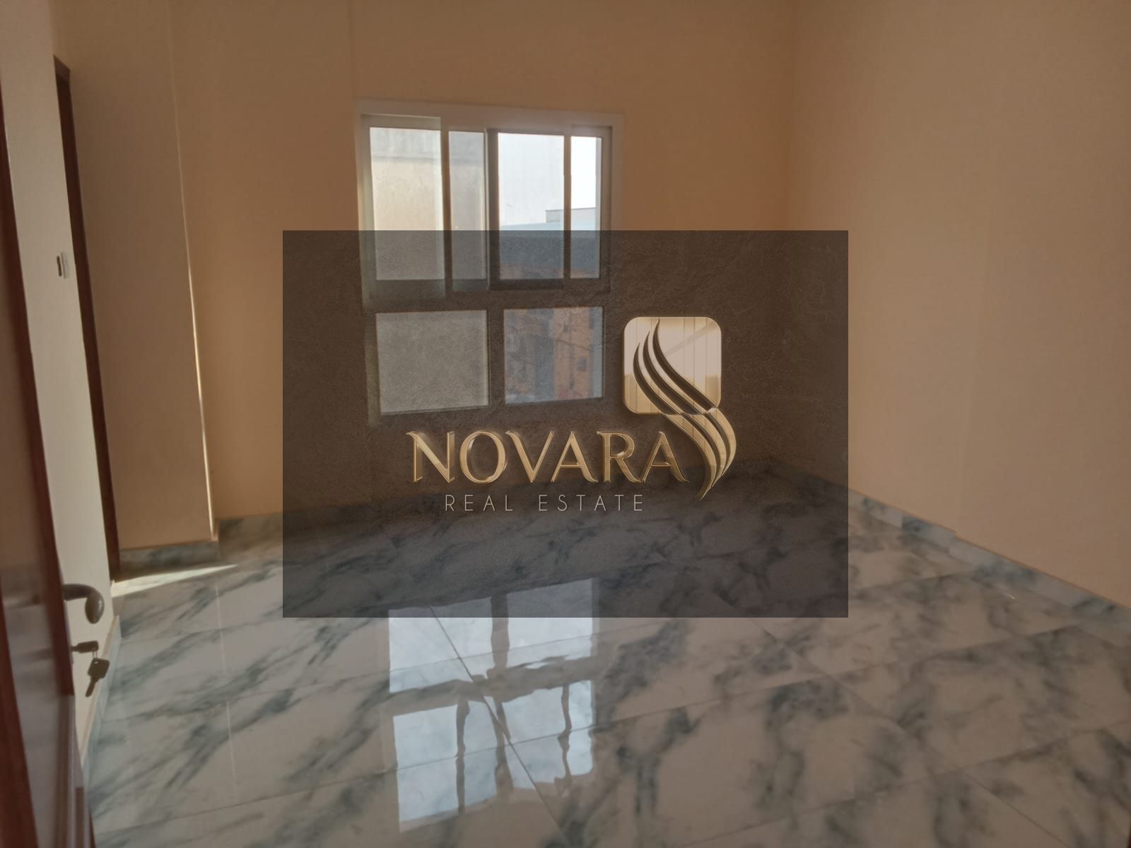 Upscale office for rent in Al Jurf Industrial Area 1, first occupancy, with a practical design offering a comfortable environment and strategic locati