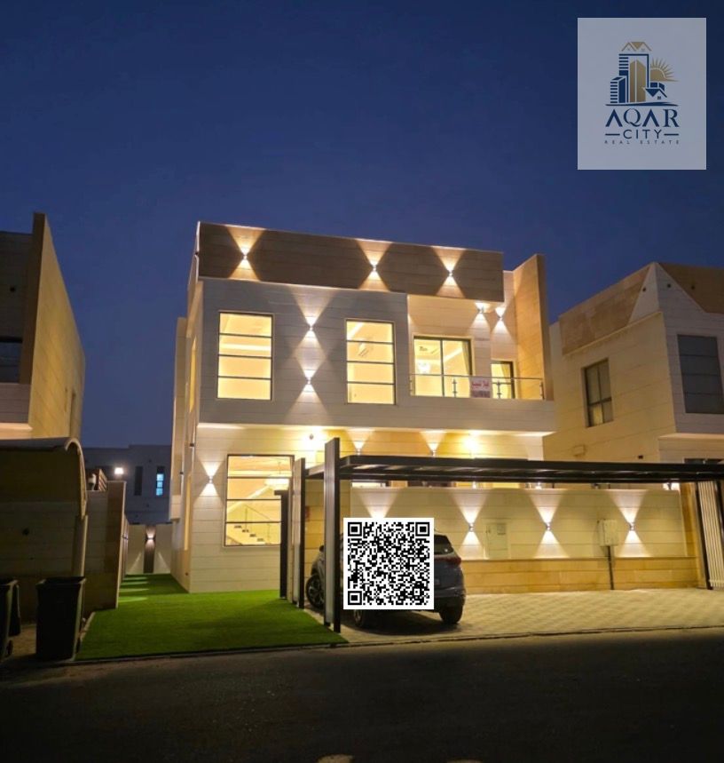 Villa for sale in Al Yasmin, custom-finished and next to a mosque. Ready with electricity, water, and air conditioning. Features include: 5 master bedrooms, a large majlis with bathroom and washbasins, a large living room, a large kitchen, a maid's room,