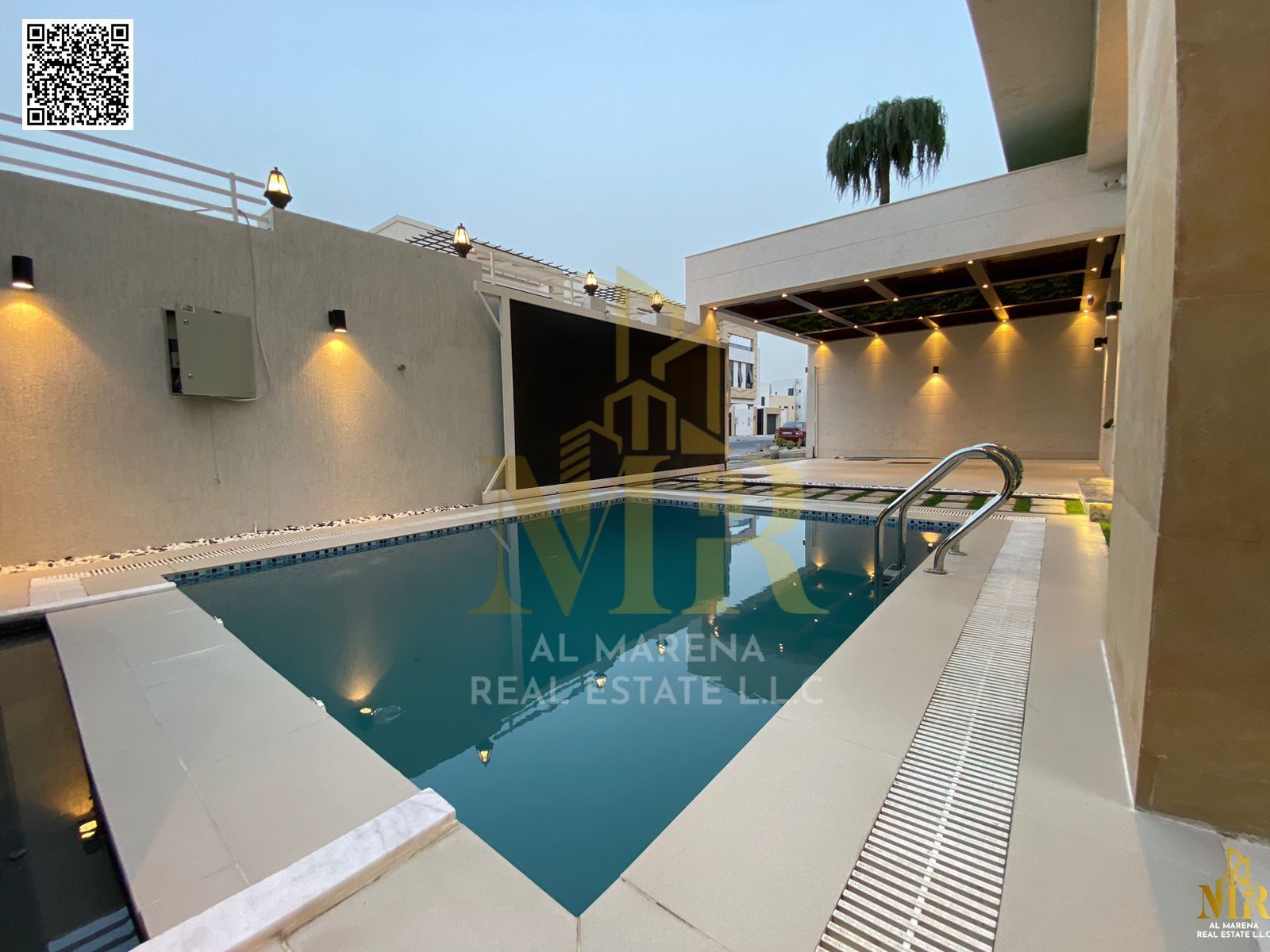"Luxury villa in Al Helio 2, Ajman - 5 master bedrooms, modern design, private pool, indoor waterfall, prime location near Mohammed Bin Zayed Road"