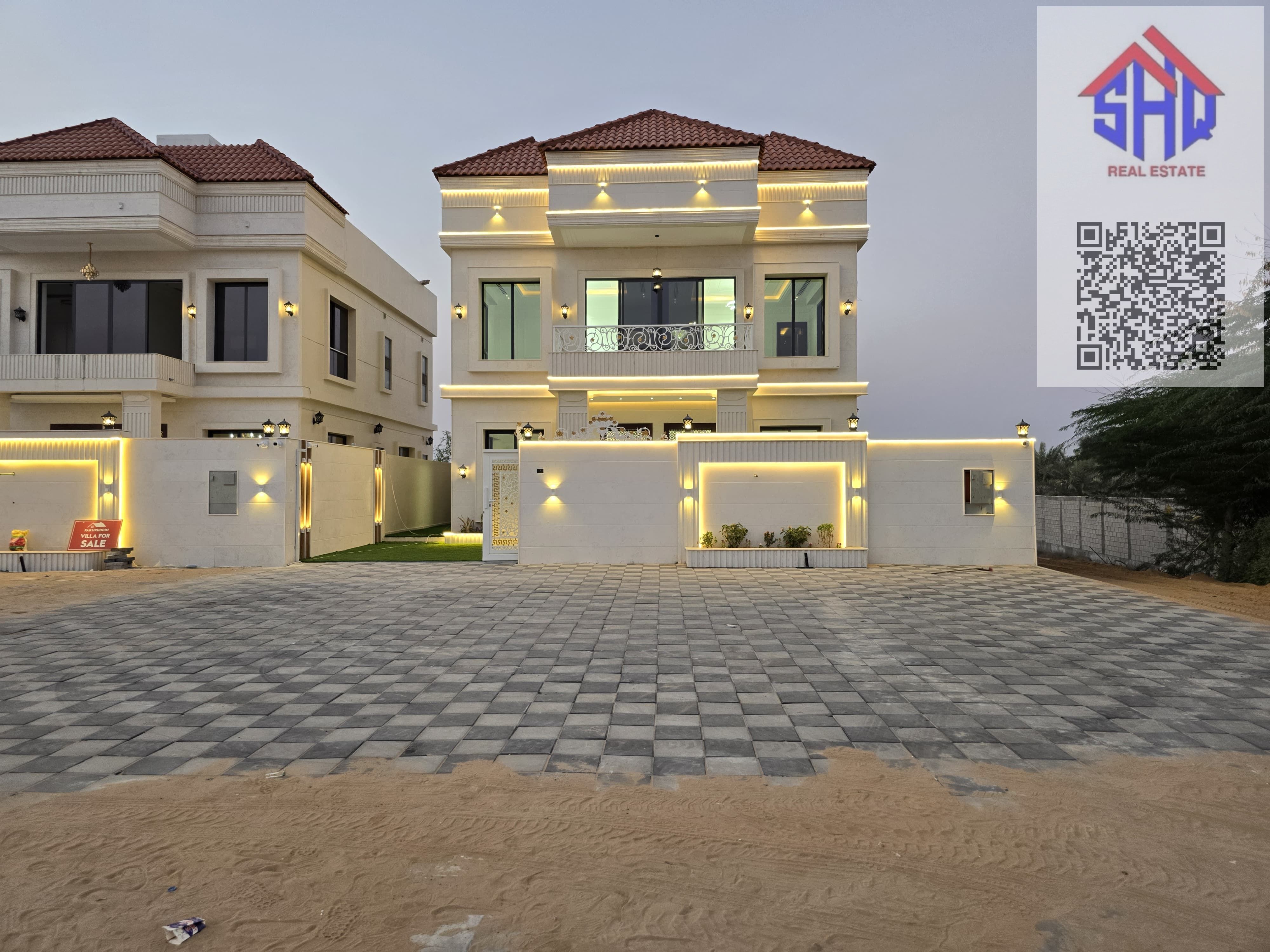 For sale: Ground and first floor villa + roof + garden with waterfall in the yard, five master bedrooms with built-in wardrobes, living room, majlis, maid's room, and a 25-meter outdoor setback.