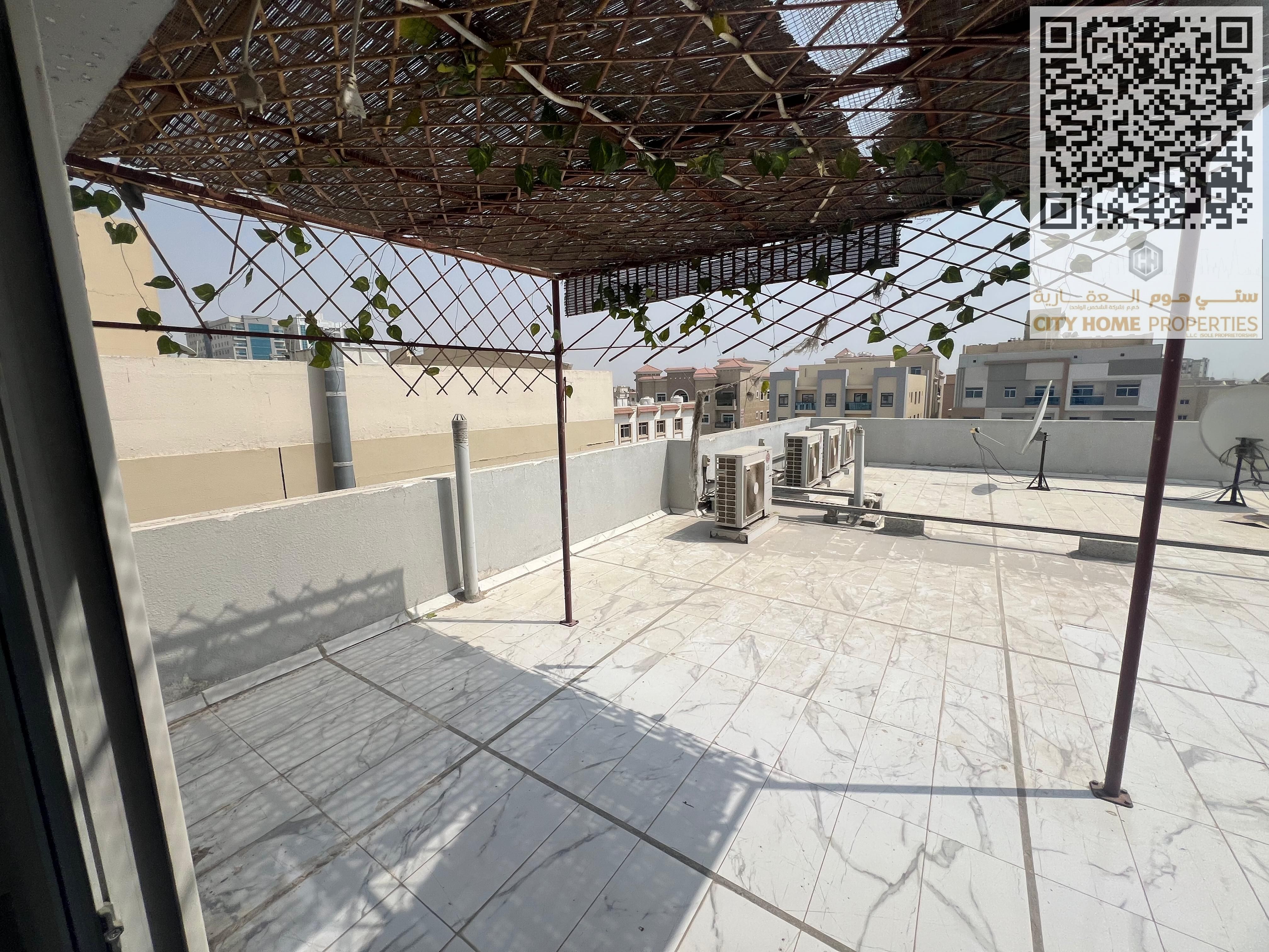 1BHK with a large rooftop – spacious unit in a family building – available for annual rent in Ajman