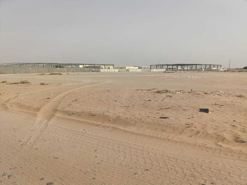 Land for sale in Al Qasimia City, Block 1. Land area: 19,300 square feet. Prime location.