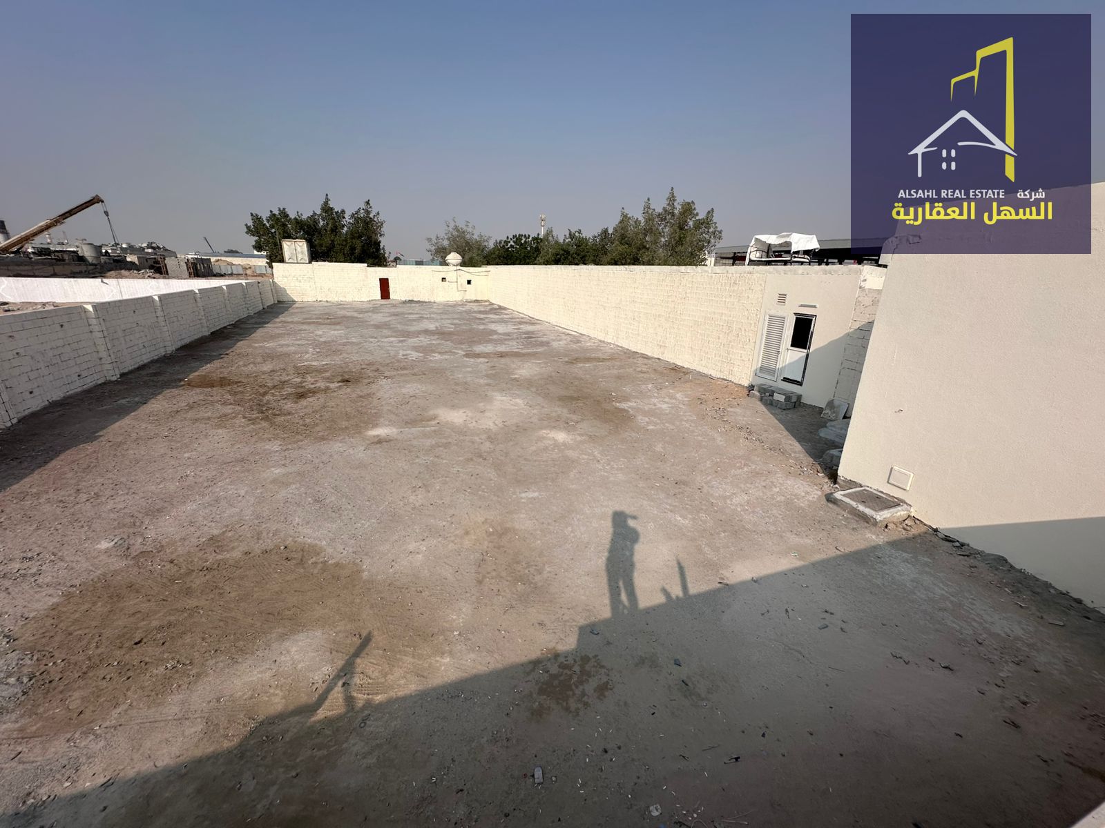 A plot of land for sale in the Al Sajaa Industrial Area