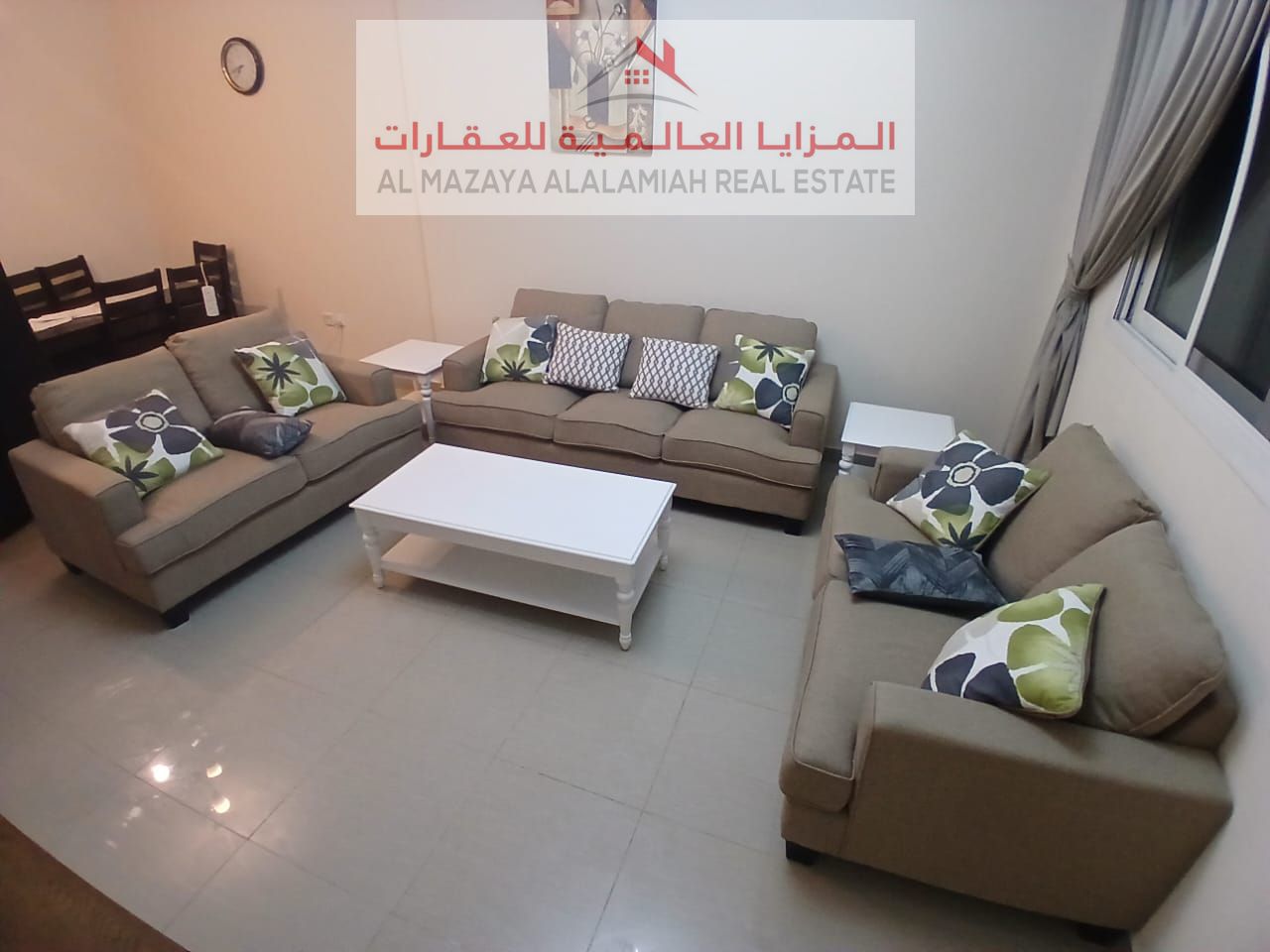 A fully furnished two-bedroom apartment with a living room in Al Taawun for monthly rent with internet
