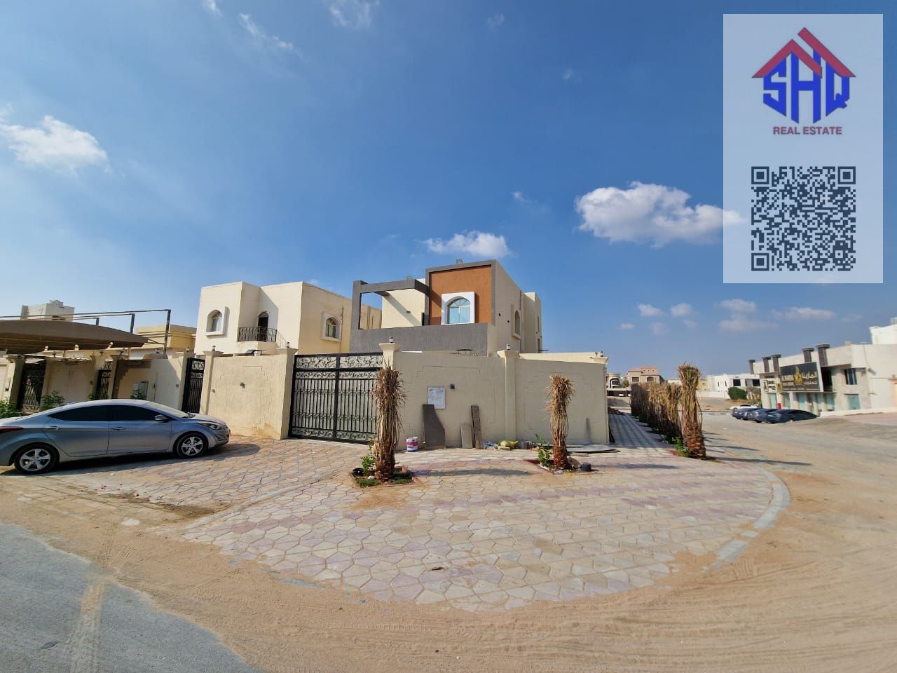 Corner villa with water and electricity for sale and AC freehold for all nationalities
