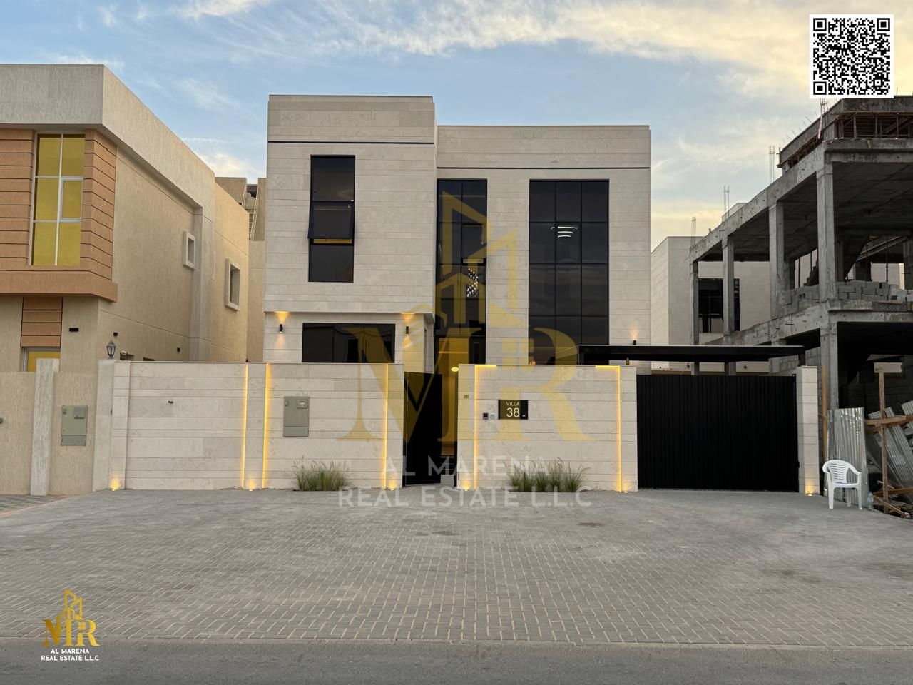 Luxury villa for sale in Al Zahiyah, Ajman. Two floors and a roof terrace, priced at AED 1,520,000. Modern design. Luxury villa for sale in Al Zahiyah