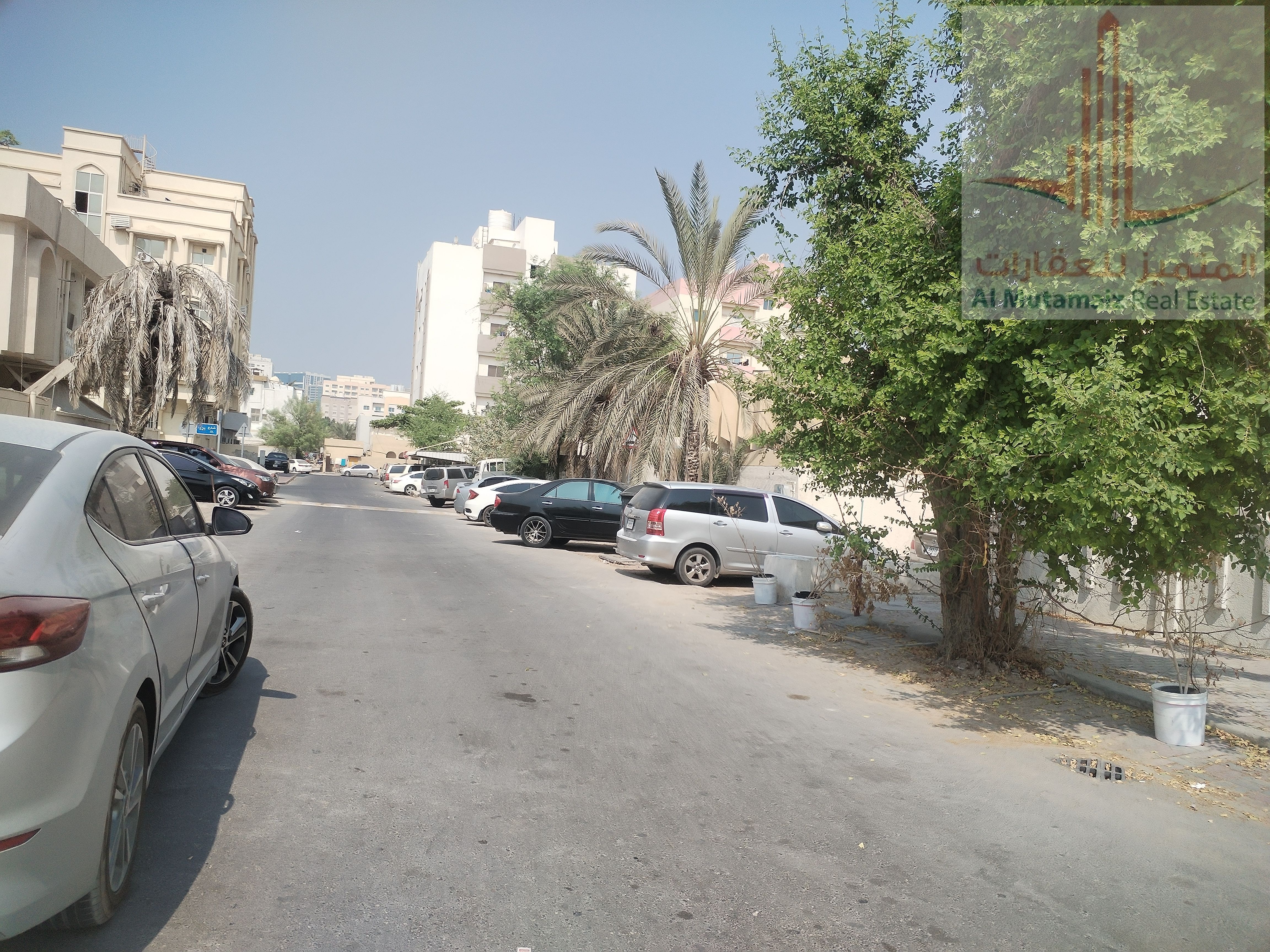 Commercial land for sale in Ajman, Al Nuaimiya 1, in an excellent location, on a corner of two streets,