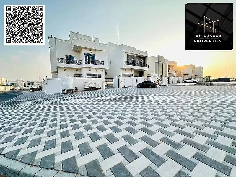 Luxury villa with a modern design, high-end finishes, and a garden, priced including air conditioning and freehold ownership for all nationalities.