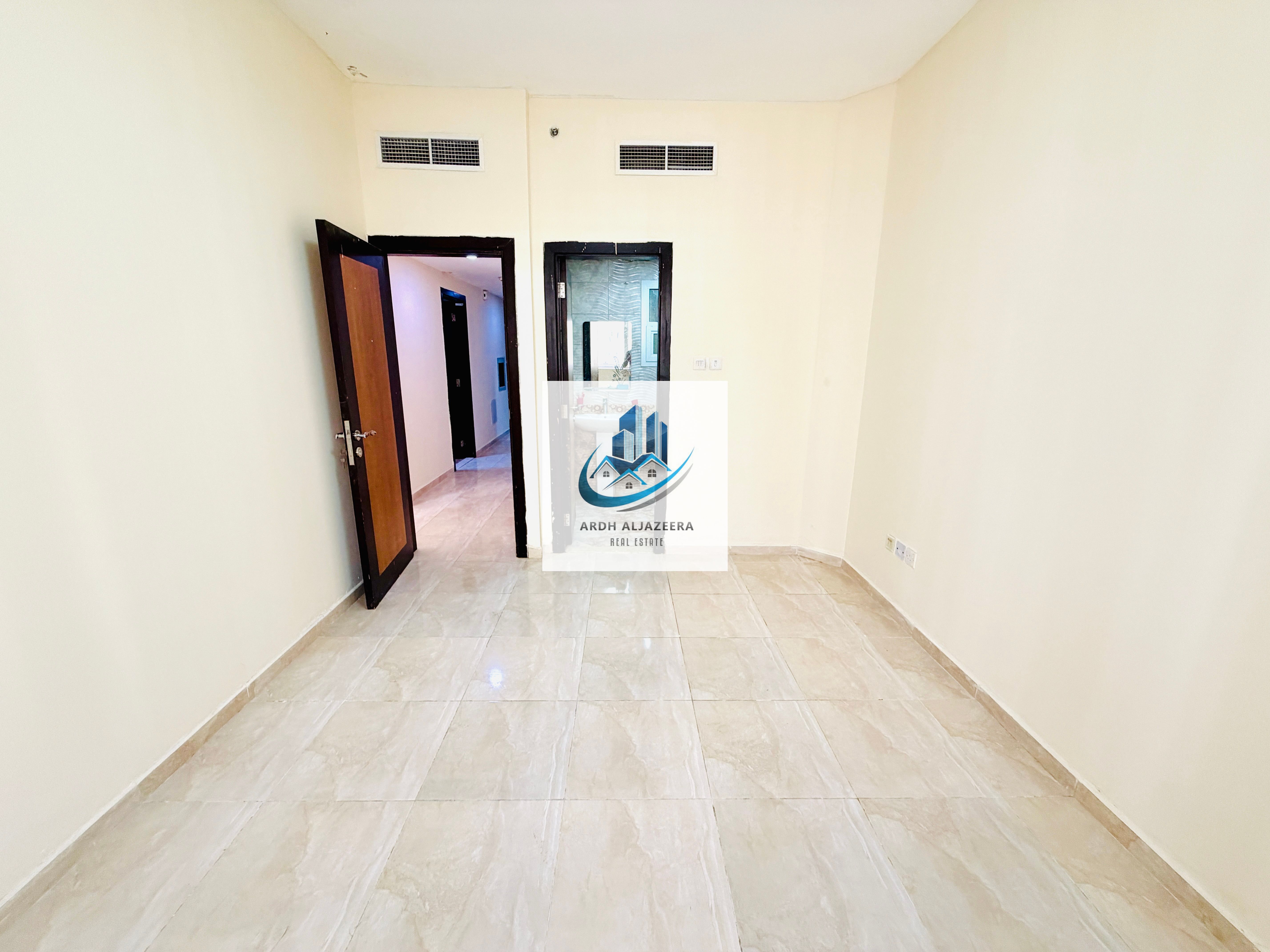 Hot Offer! Spacious 1 BHK Apartment with a Master Bedroom, Balcony, and Free Parking — conveniently located near Sehra Center. All this for only AED 35,000 per year!