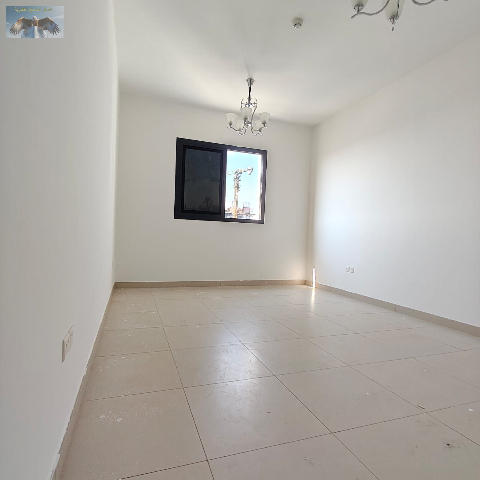 Spacious 1BHK apartment with 2 bathrooms and private parking on Etihad Street, Ajman, near Fashion Zone and Al Murjan Center, easy access to Dubai & S