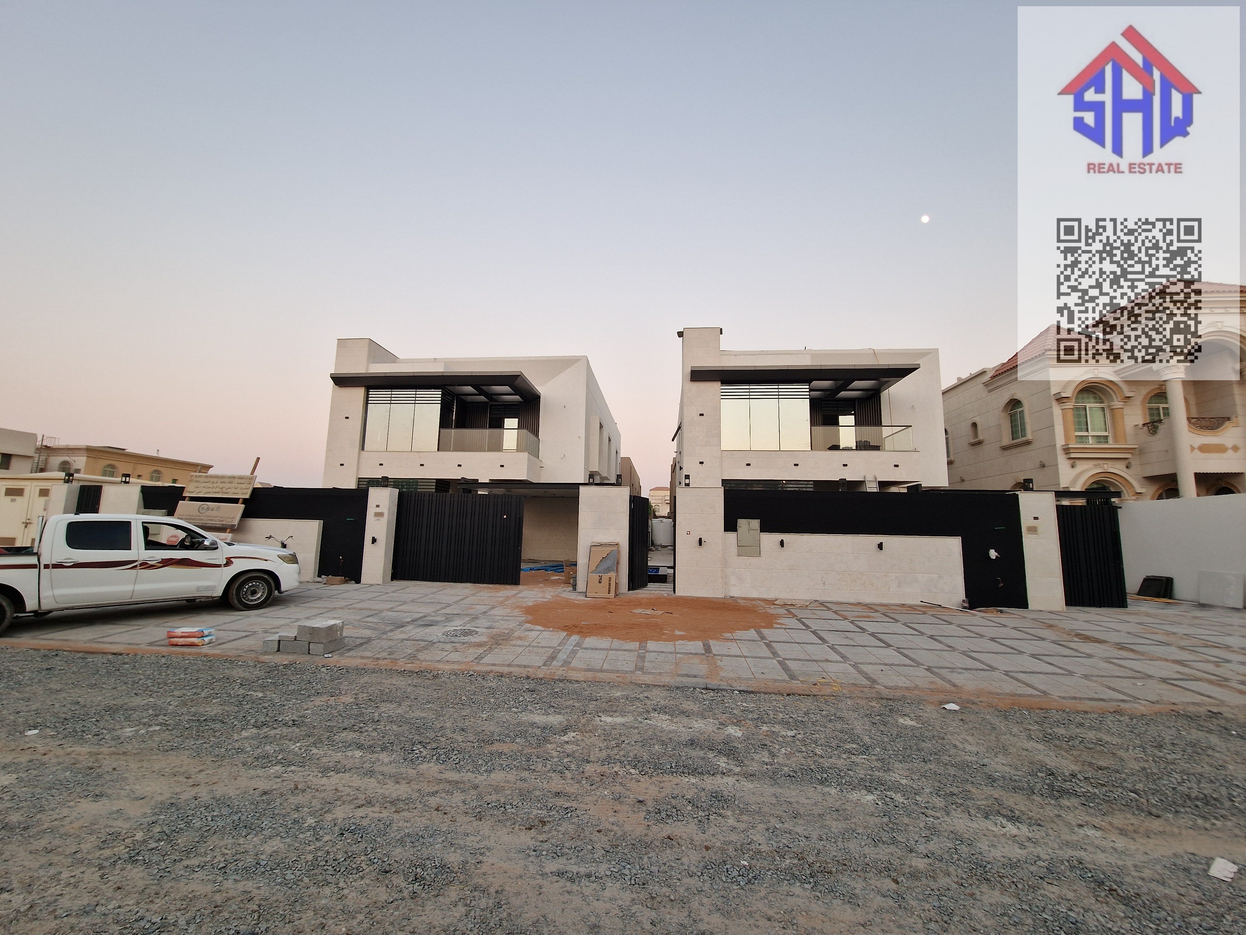 Villa for sale with waterfall and garden, including central air conditioning, five bedrooms, majlis, 2 living rooms, maid's room with indoor canopy