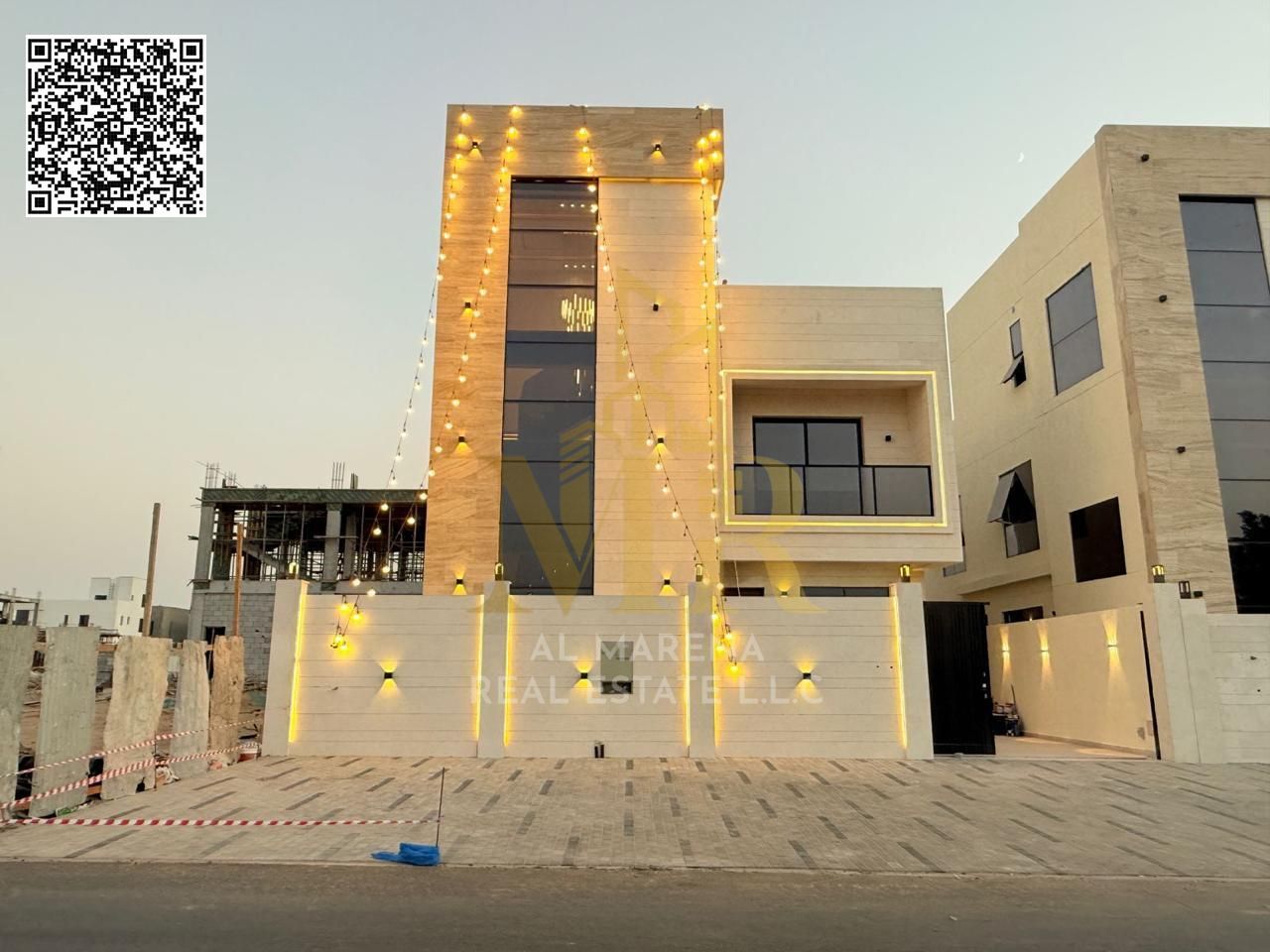 A villa for sale in Ajman, two floors and a roof, including the registration and ownership fees, special location, super deluxe finishes, special pric