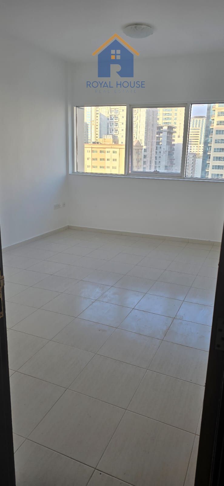 1BR Apartment in Al Taawun with Parking