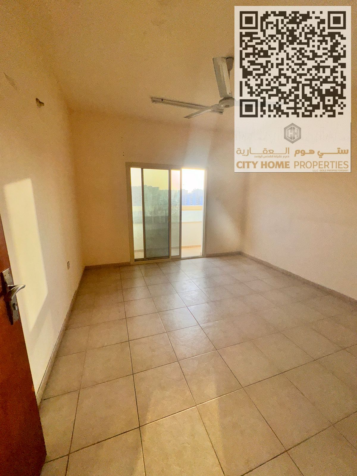 > What is the lowest annual rent for a 2 bedrooms + hall apartment in the Al Hamidiya area, close to all services and with easy exit to Dubai and Shar