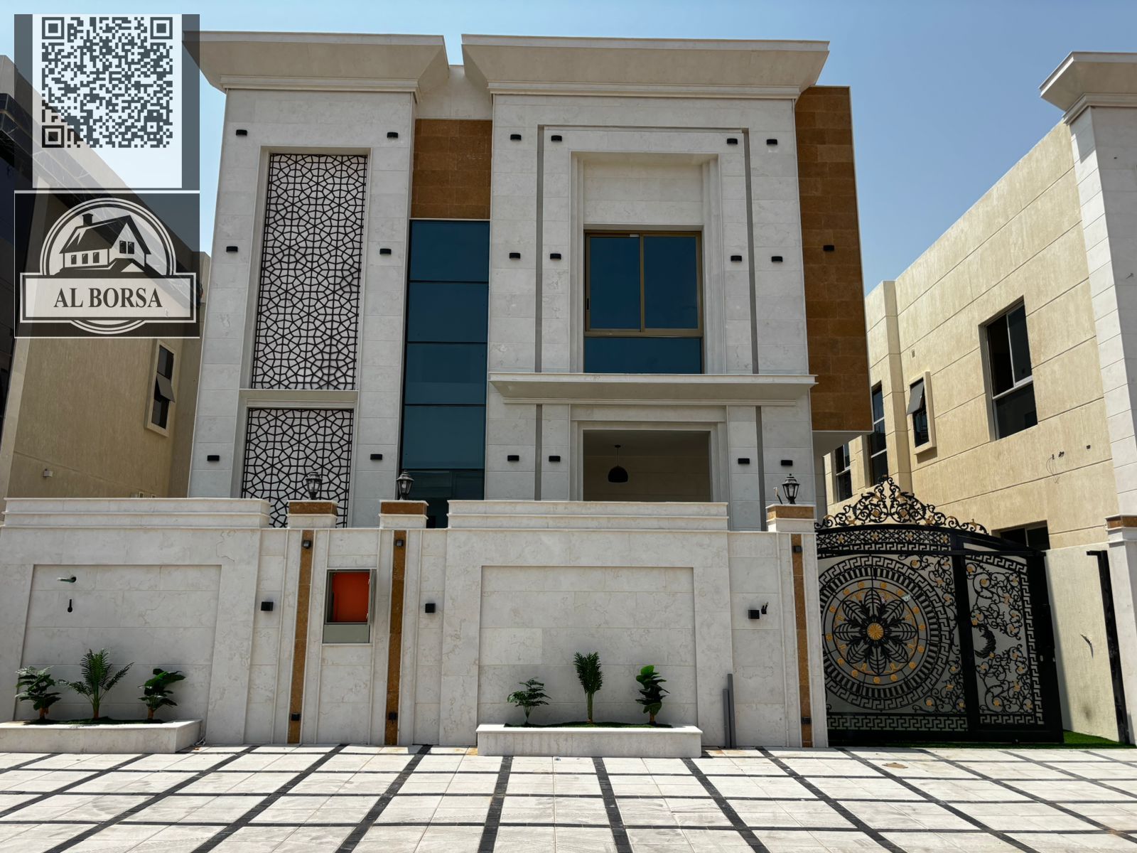 Villa for sale in Al Zahia, Ajman. 5 master bedrooms, majlis, 2 living rooms, built-in wardrobes, and a spacious kitchen.
