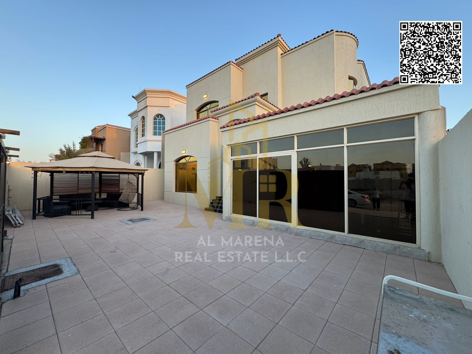 A commercial residential villa in Al Rawda on the main street at a price that includes electricity, water and air conditioners fees, ready to live in