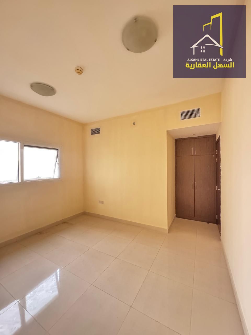 Spacious two-bedroom apartment for rent in Al Qasba, prime location with parking